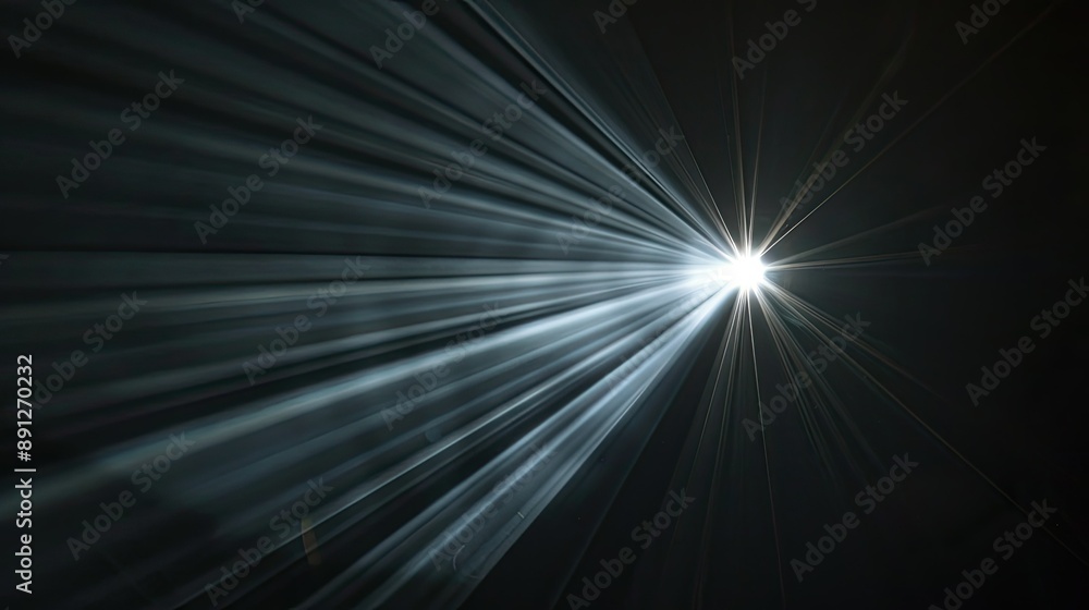 Close-up of a bright light beam cutting through darkness on black Close-up of a bright light beam cutting through darkness on black