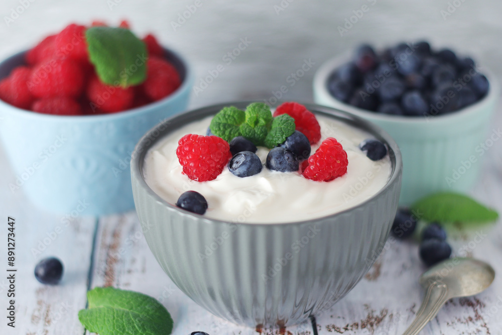A bowl with Greek yogurt with berries A bowl with Greek yogurt with berries