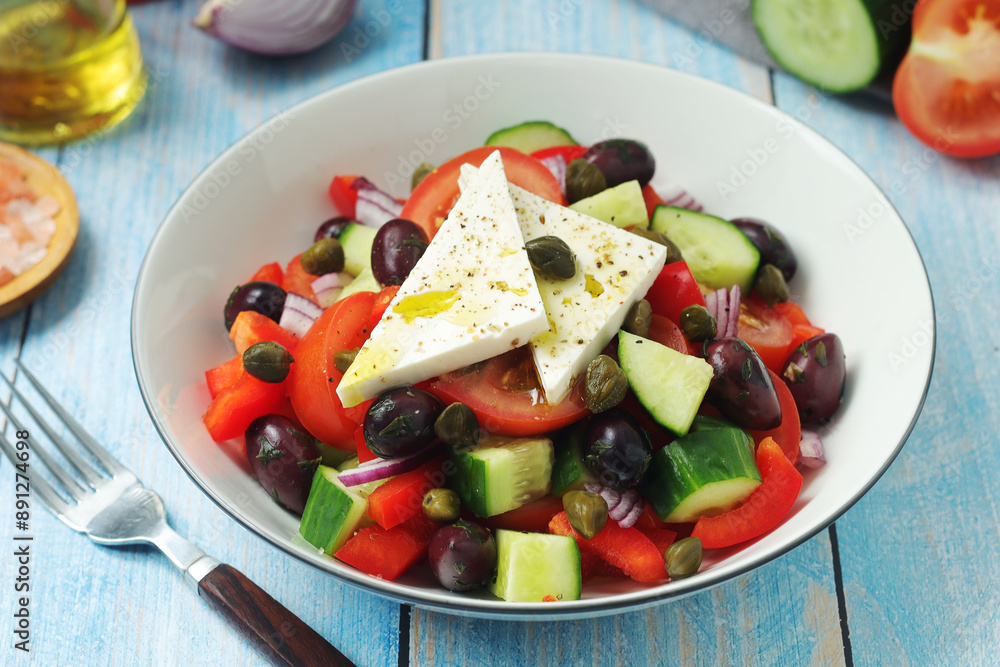 A bowl with traditional Greek salad Horiatiki A bowl with traditional Greek salad Horiatiki