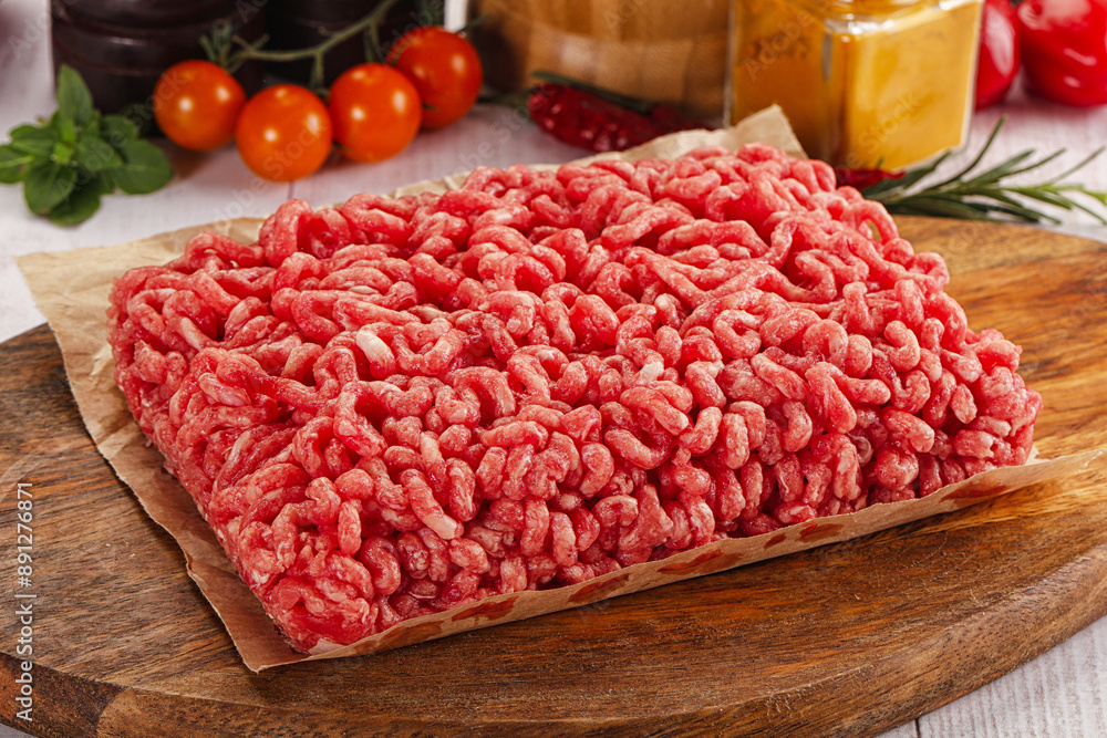 Raw minced beef meat over board Raw minced beef meat over board