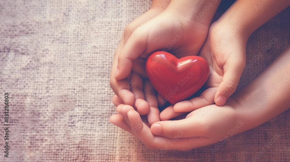 Hands Holding a Red Heart Hands Holding a Red Heart