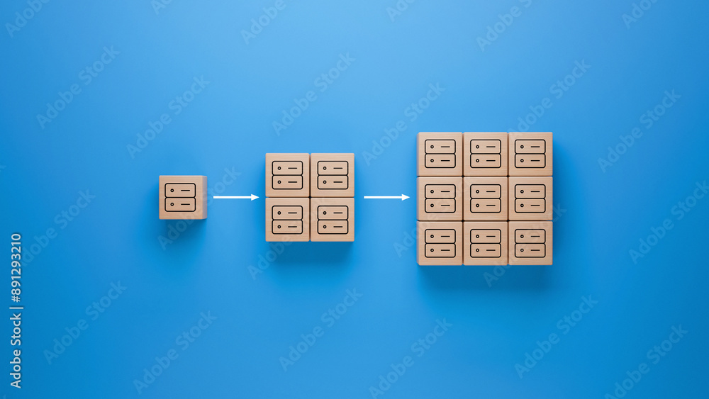 Wooden blocks with server icon on blue background, expanding network represented by increasing blocks, technology infrastructure growth and data management in IT computing concept Wooden blocks with server icon on blue background, expanding network represented by increasing blocks, technology infrastructure growth and data management in IT computing concept
