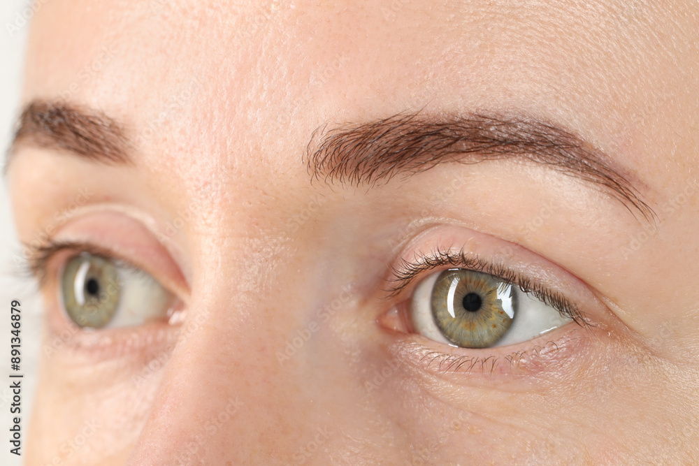 Fototapeta premium Woman with beautiful green eyes, closeup view