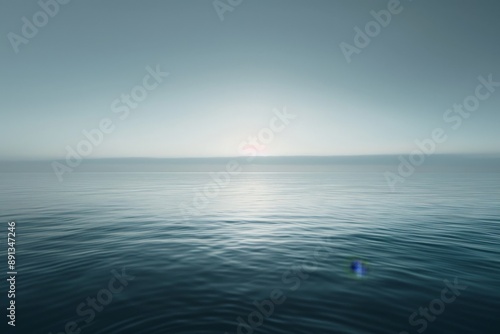 A tranquil scene of the ocean blended seamlessly into a soft, hazy horizon, capturing the calmness of the sea under a gentle, overcast sky, evoking peace and tranquility.