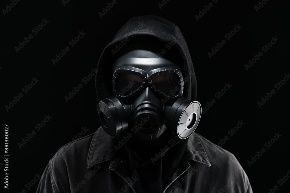 Man in gas mask on black background Man in gas mask on black background
