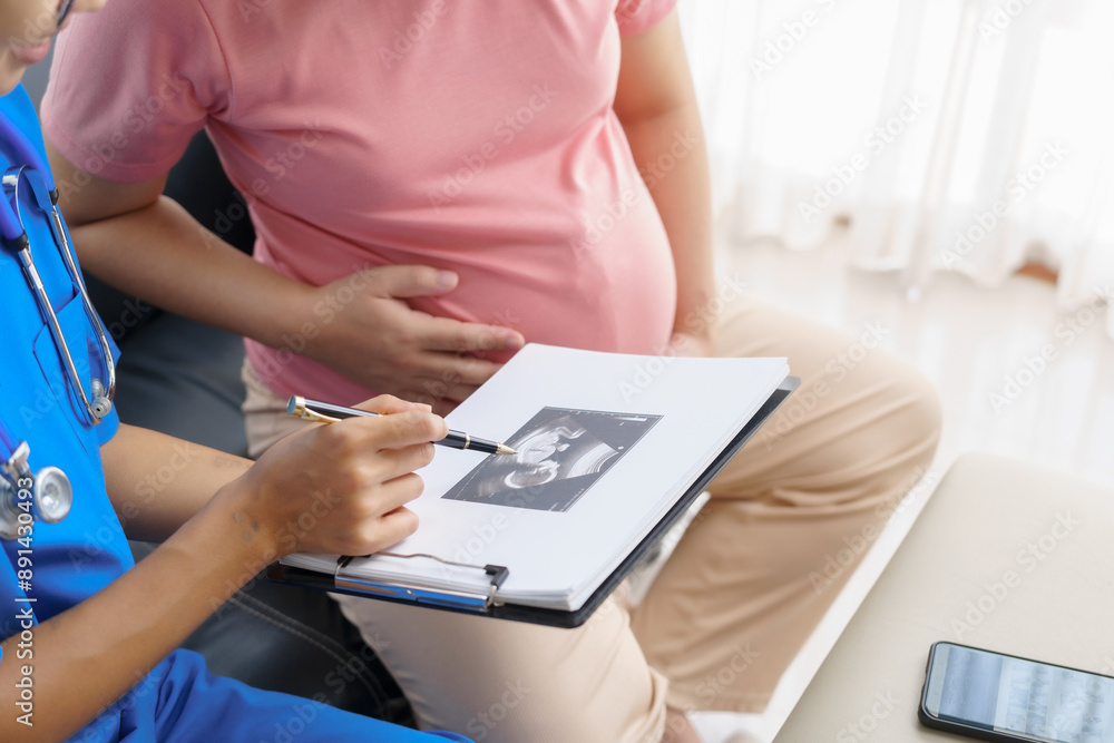 Pregnant mothers meet the nurse at the clinic as scheduled, reviewing their medical history and discussing symptoms. Sitting on the sofa, they report headaches, nausea, and back pain to the nurse. Pregnant mothers meet the nurse at the clinic as scheduled, reviewing their medical history and discussing symptoms. Sitting on the sofa, they report headaches, nausea, and back pain to the nurse.