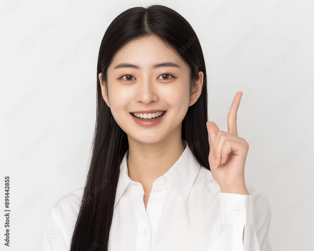 Long hair cheerful asian woman, pointing one finger, commercial photo, product introduction Long hair cheerful asian woman, pointing one finger, commercial photo, product introduction