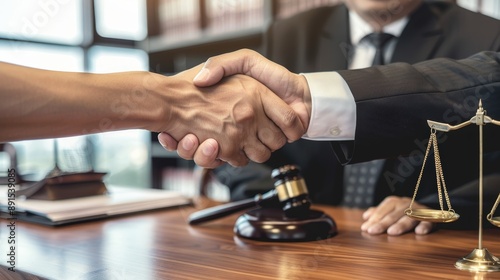 Wallpaper Mural Lawyer and Client Handshake with Scale of Justice on Wooden Table Torontodigital.ca
