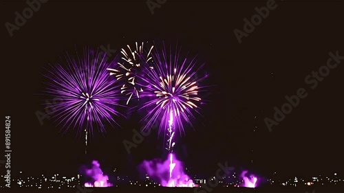 A series of fireworks are lit up in the sky, with each firework having a different color. The fireworks are arranged in a row, with the first firework being blue, the second being red photo