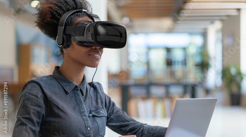 Engaging E-Learning with Virtual Reality: Student in VR Headset Exploring Educational Software on Laptop