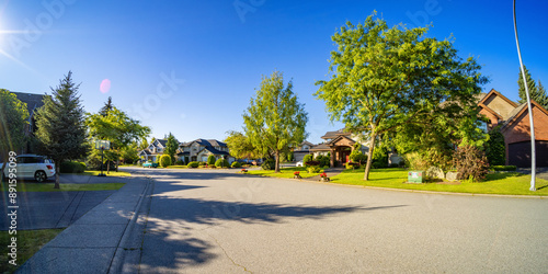Papier peint Residential Homes in a suburban city street sunny morning