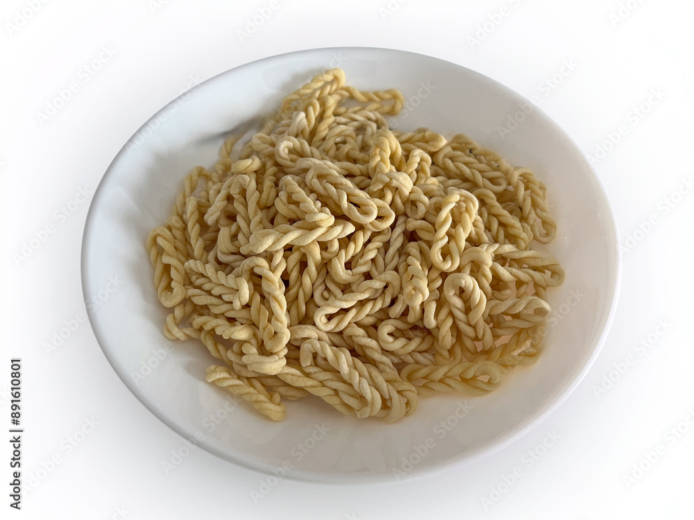 Lorighittas, ancient traditional Sardinian pasta, refined, hand-woven spaghetti made of semolina and water Lorighittas, ancient traditional Sardinian pasta, refined, hand-woven spaghetti made of semolina and water