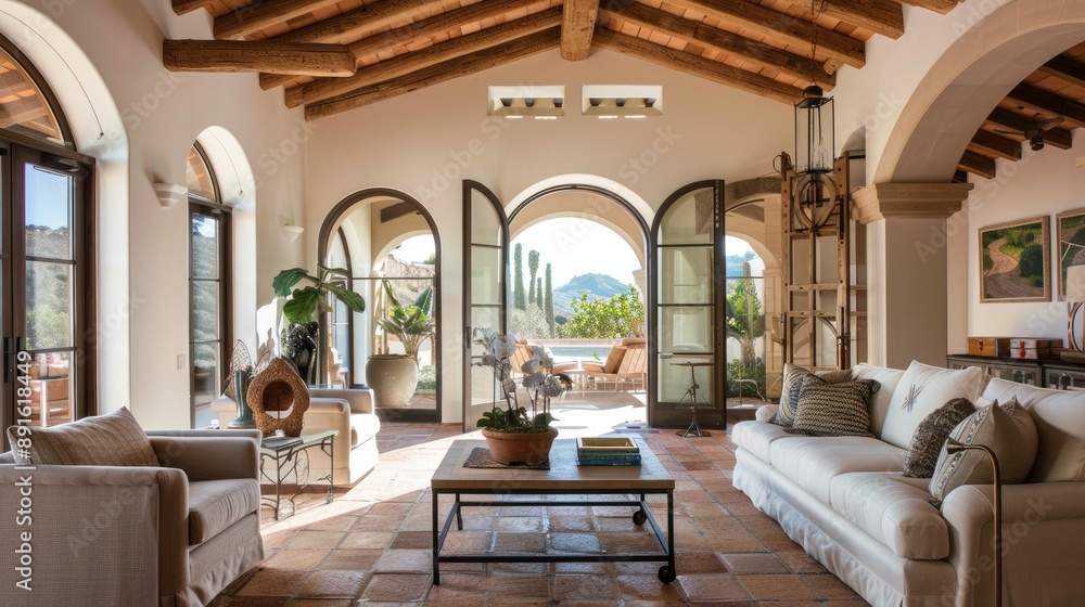 A Mediterranean-style living room with arched doorways A Mediterranean-style living room with arched doorways
