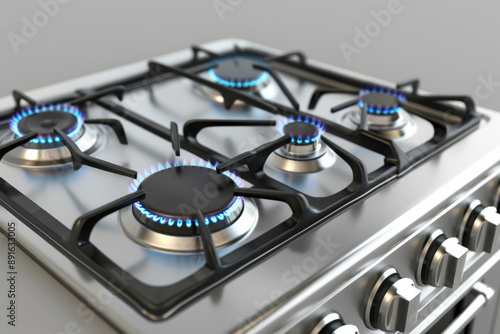 A close-up of a modern gas stove, with all burners lit, casting a bright blue flame in a sleek, stainless steel kitchen environment.