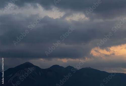 Dark Cloudy Sky Over Mountain Range