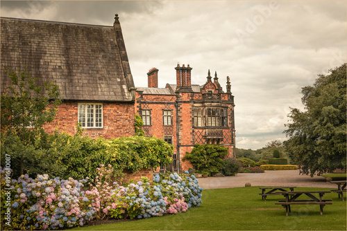 Gardens with borders of flowers and benches