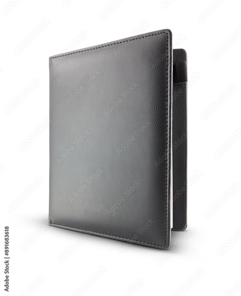 Naklejka premium Black color leather fabric hardcover notebook isolated on white background