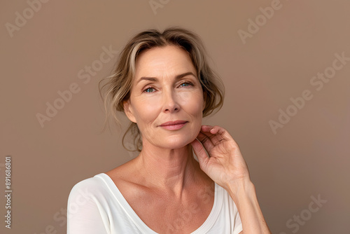 Close-up of a 50-year-old woman with natural skin and no makeup