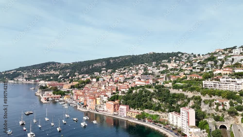 Aerial drone view of Villefranche-sur-Mer, France, highlighting the picturesque Côte d'Azur coastline and the beautiful Mediterranean Sea. Aerial drone view of Villefranche-sur-Mer, France, highlighting the picturesque Côte d'Azur coastline and the beautiful Mediterranean Sea.