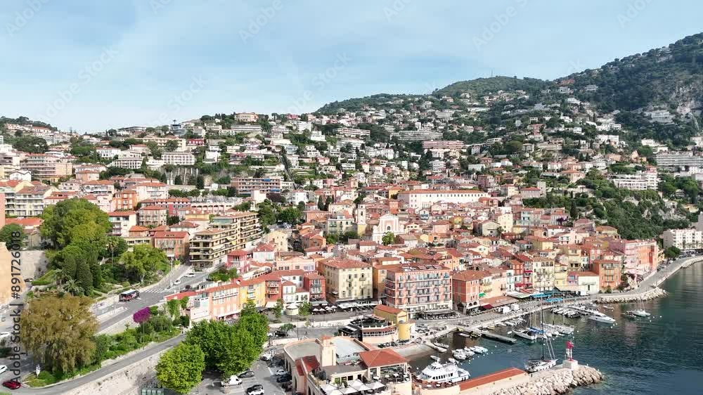Aerial drone view of Villefranche-sur-Mer, France, highlighting the picturesque Côte d'Azur coastline and the beautiful Mediterranean Sea. Aerial drone view of Villefranche-sur-Mer, France, highlighting the picturesque Côte d'Azur coastline and the beautiful Mediterranean Sea.