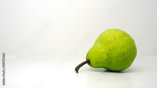 Packham's Triumph Pear, Packham pear, green pear with science name Pyrus communis on white background photo