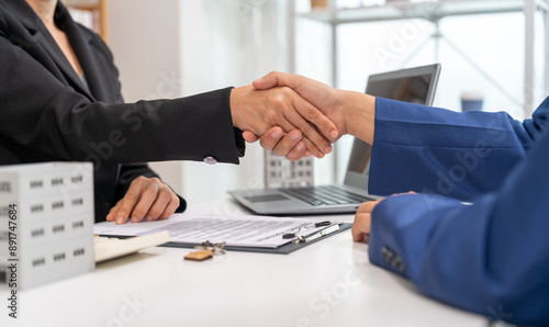 Signing a contract. Client and broker agent, lease agreement, successful deal and Young business sitting at the desk in office