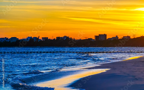 Awesome sunset at tropical Caribbean beach Playa del Carmen Mexico.