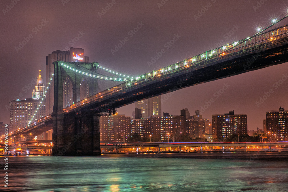 Fototapeta premium Brooklyn Bridge is a hybrid cable-stayed/suspension bridge in New York city
