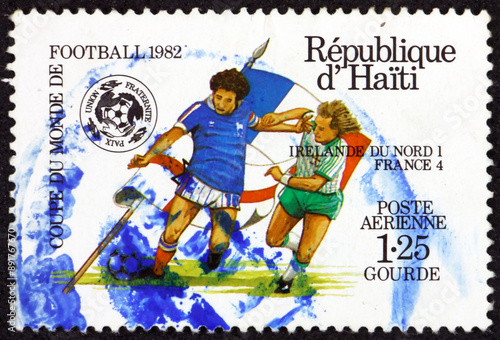 Obraz na płótnie Postage stamp Haiti 1983 Northern Ireland vs France, soccer game, 1982 World Cup w salonie