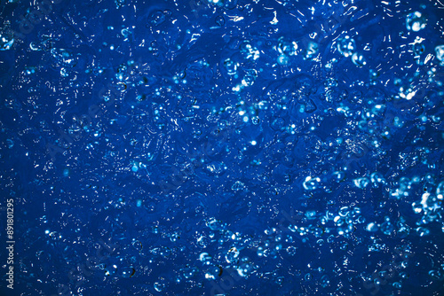 Wallpapers with whater drops in air with bubbles, blue background.