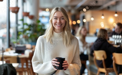 Smiling Woman in Cozy Cafe, Sipping Coffee © Mandeep