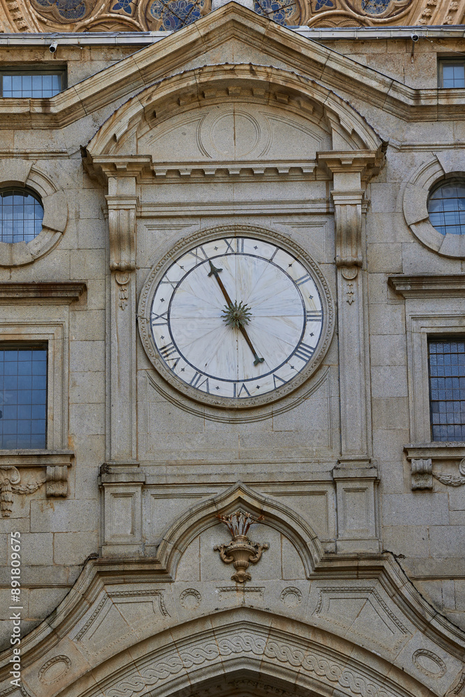 The clock above the Portal of the Clock (Puerta del Reloj) of the Toledo Cathedral (Santa Iglesia Catedral Primada de Toledo). Toledo, Spain - April 30, 2024. The clock above the Portal of the Clock (Puerta del Reloj) of the Toledo Cathedral (Santa Iglesia Catedral Primada de Toledo). Toledo, Spain - April 30, 2024.