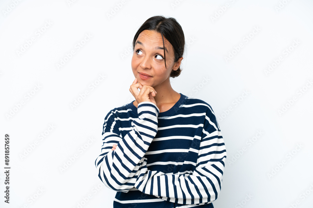 Young hispanic woman isolated on white background thinking an idea while looking up Young hispanic woman isolated on white background thinking an idea while looking up