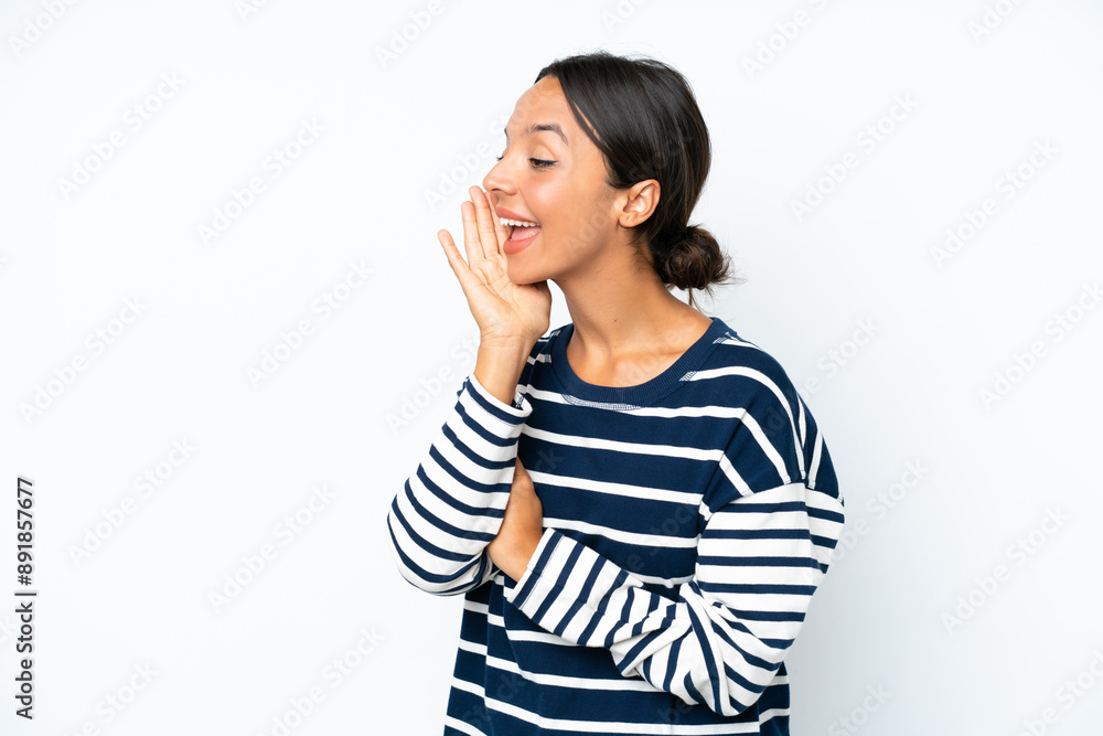 Young hispanic woman isolated on white background shouting with mouth wide open to the side Young hispanic woman isolated on white background shouting with mouth wide open to the side
