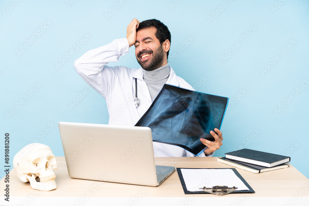 Professional traumatologist in workplace smiling a lot Professional traumatologist in workplace smiling a lot