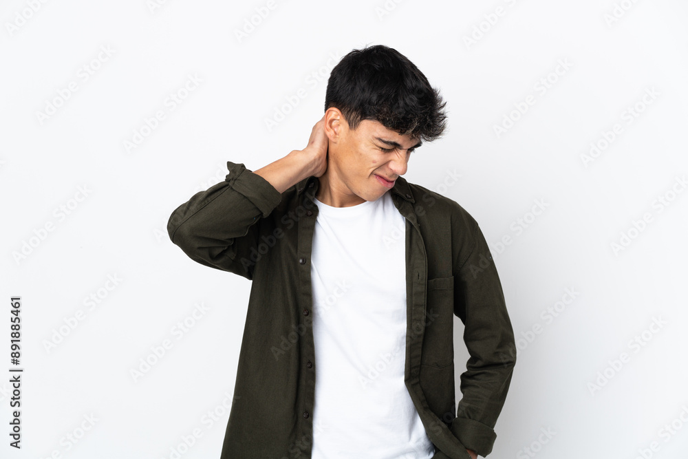 Young man over isolated white background with neckache Young man over isolated white background with neckache