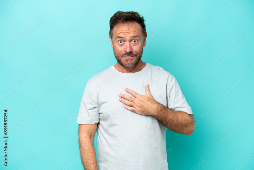 Middle age caucasian man isolated on blue background pointing to oneself Middle age caucasian man isolated on blue background pointing to oneself