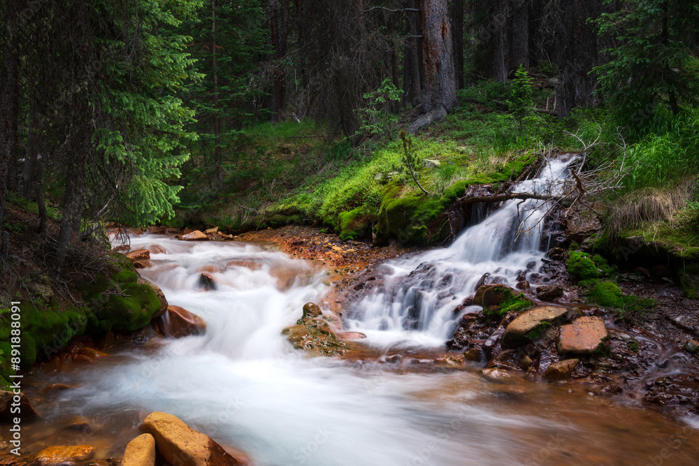 Beautiful mountain creek cascading through rocks
Beautiful mountain creek cascading through rocks