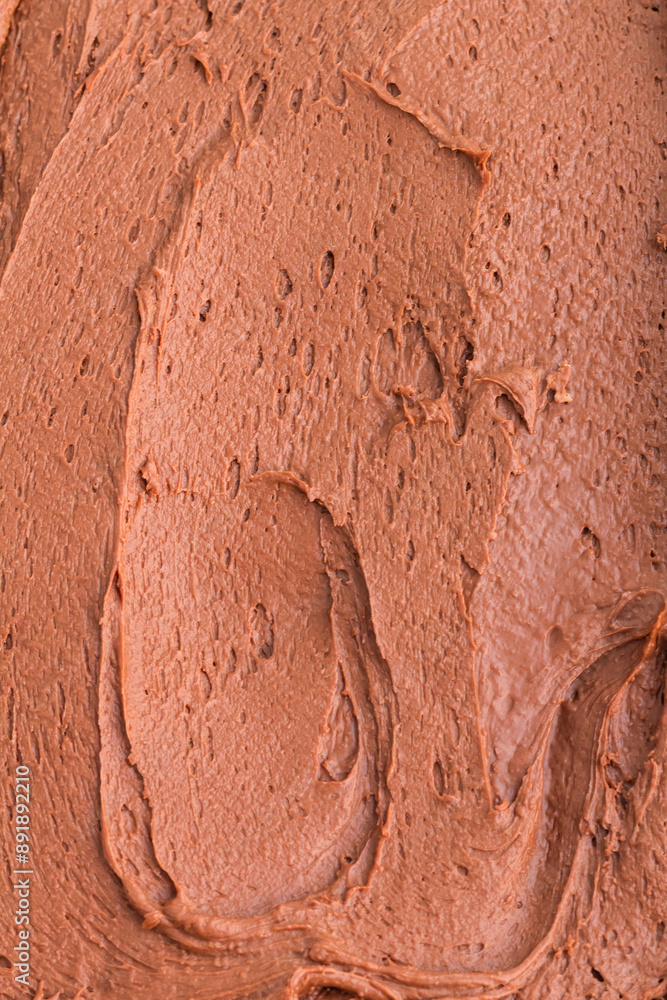 Fototapeta premium Close-up texture of smooth, rich chocolate frosting