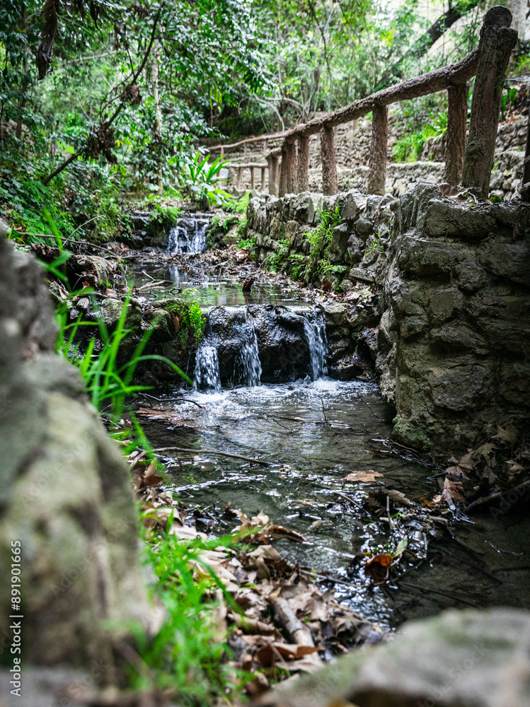A long exposure picture taken of a river waterfall on a trail up a mountain in California. A long exposure picture taken of a river waterfall on a trail up a mountain in California.