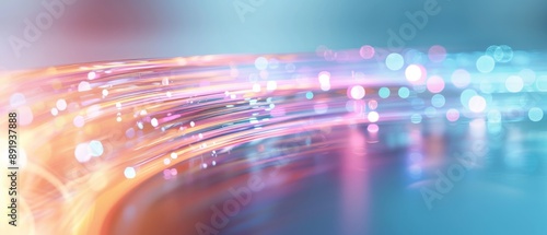 Abstract digital data and technology background with colorful light streaks. Blurred motion effect of glowing lines and bokeh.
