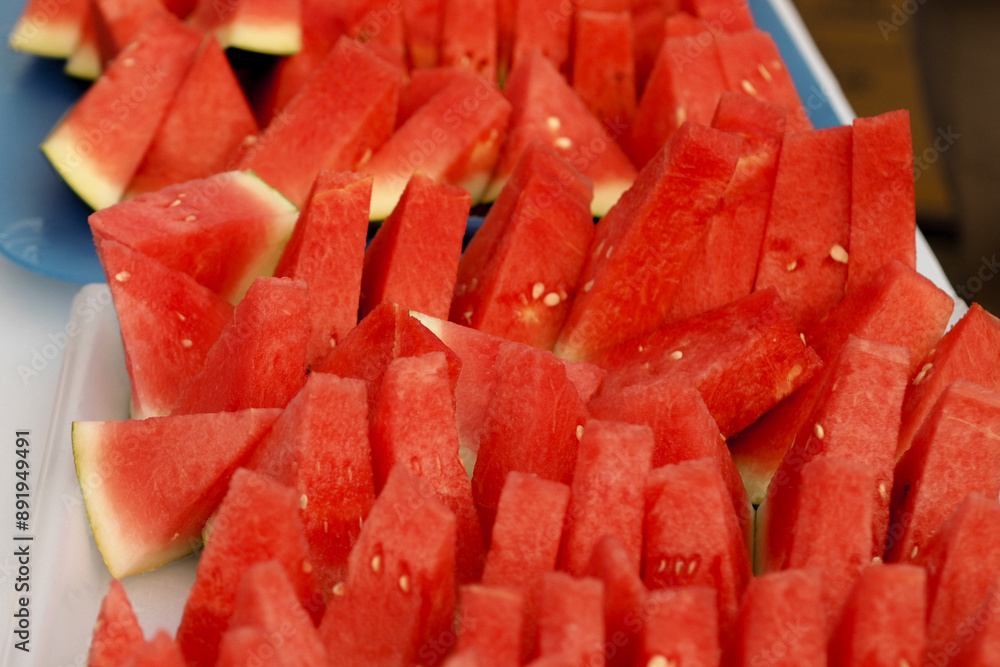 close up of a watermelon being cut, good for article close up of a watermelon being cut, good for article