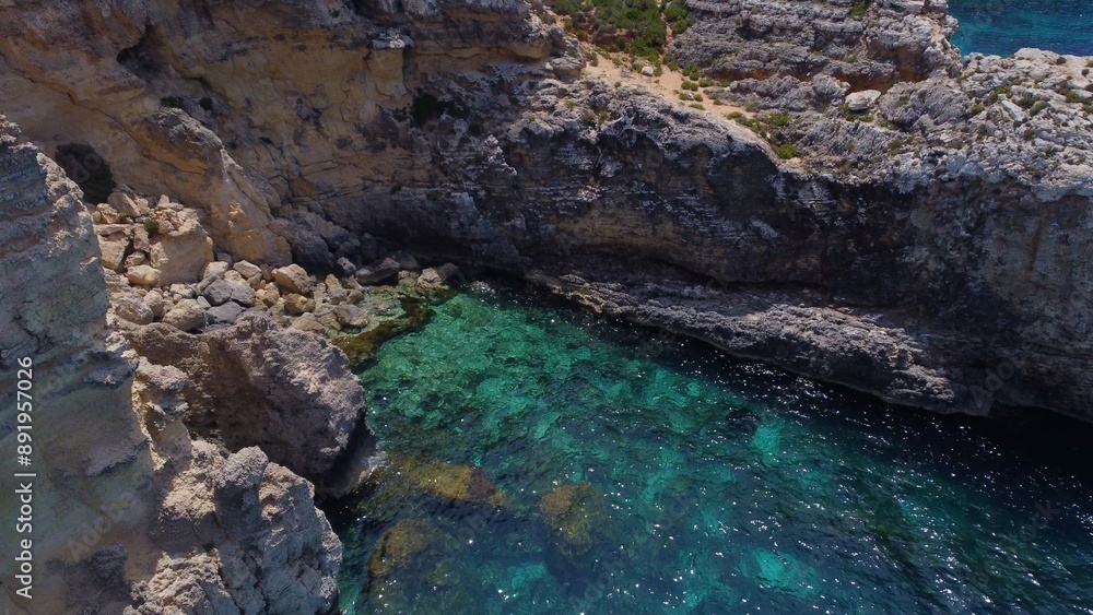 Cristal algoon Comino, L-Ghar ta Bla Saqaf or The roofles Cave Aerial View. . High quality photo Cristal algoon Comino, L-Ghar ta Bla Saqaf or The roofles Cave Aerial View. . High quality photo