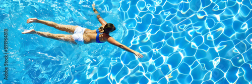 Nadador mergulhando em uma piscina photo