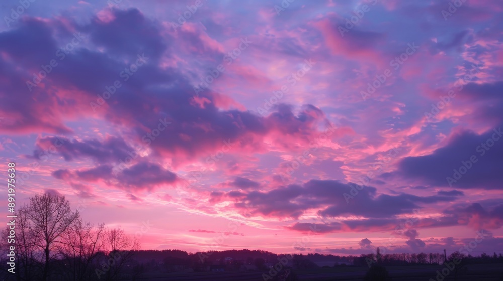 Naklejka premium Soft pink and purple hues of the sky at twilight