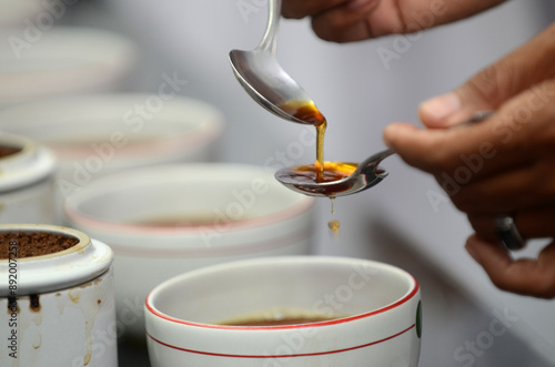 Detailed photo of tea drops tasted by a tea taster photo