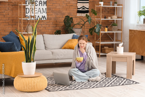 Sick young woman with sore ...