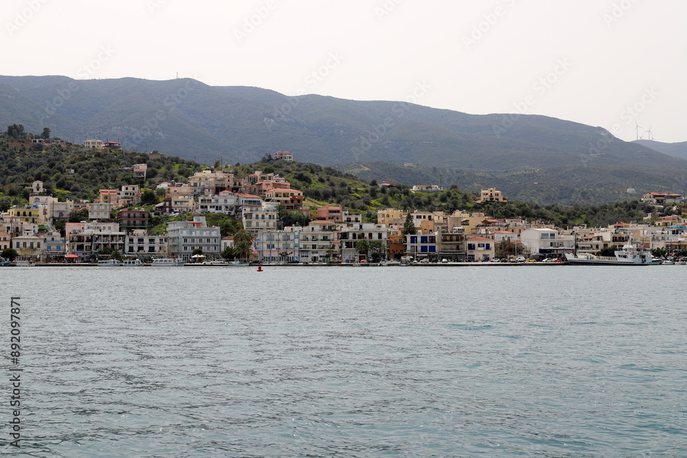 View from the deck of a steamship on a small island in the Aegean Sea. View from the deck of a steamship on a small island in the Aegean Sea.