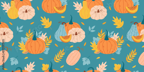 Seamless pattern with pumpkins and autumn leaves