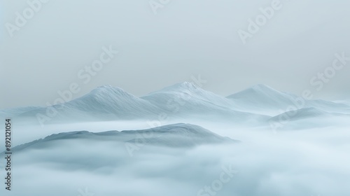 Soft blue-gray mist enveloping a distant mountain range. © Danish